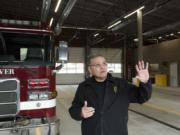 Vancouver Fire Chief Joe Molina explains the traffic signal system around the new Vancouver Fire Station 1 in the station bay in January. He acknowledged more is needed to bring the department and its facilities into the modern age.