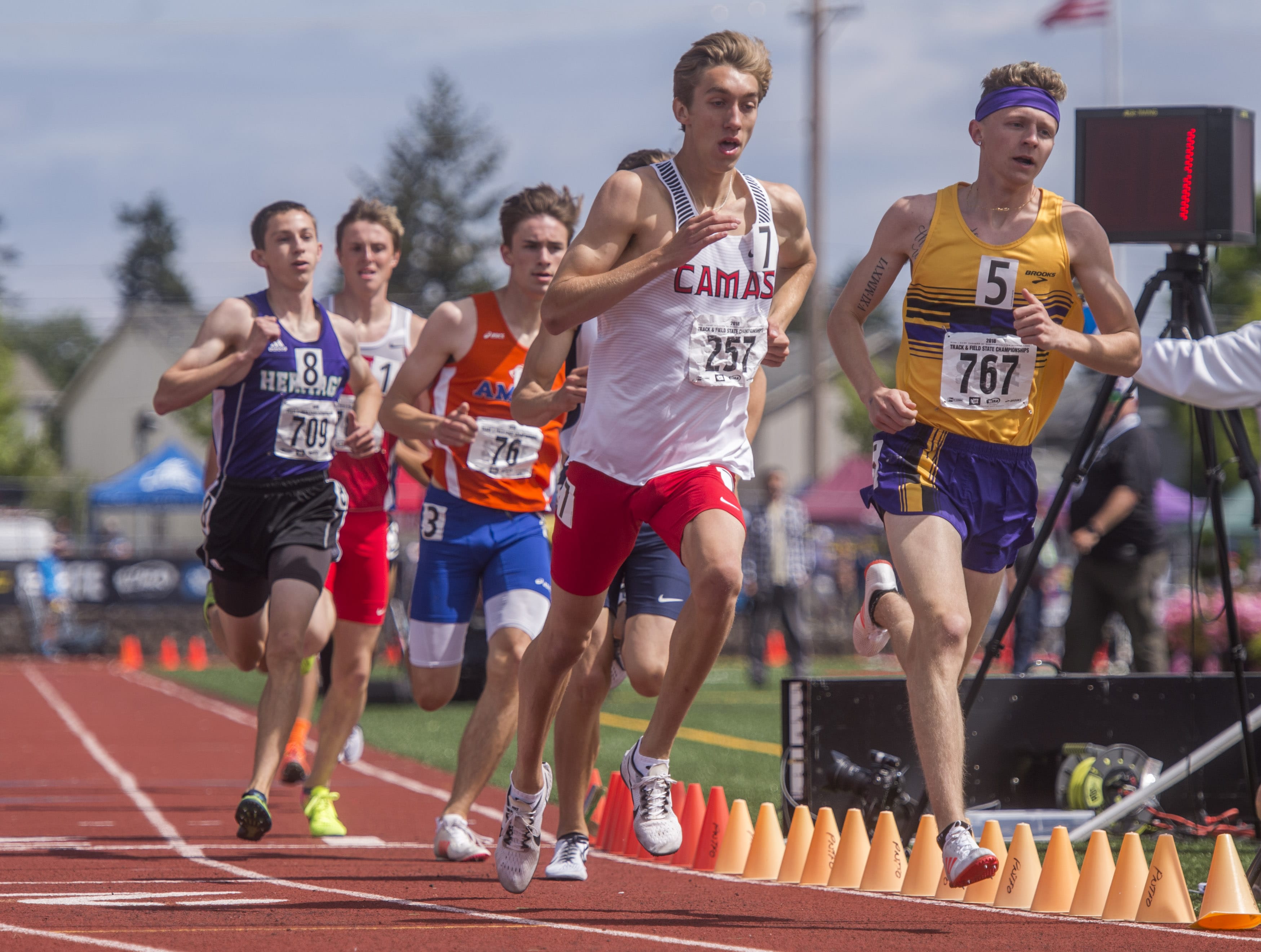 Midway through the boys 4A 800 meter run Daniel Maton of Camas (left) was side-by-side with Luke George of Issaquah, then went ahead to win with a comfortable margin at the state 2A, 3A, 4A Track &amp; Field Championships held at Mt.