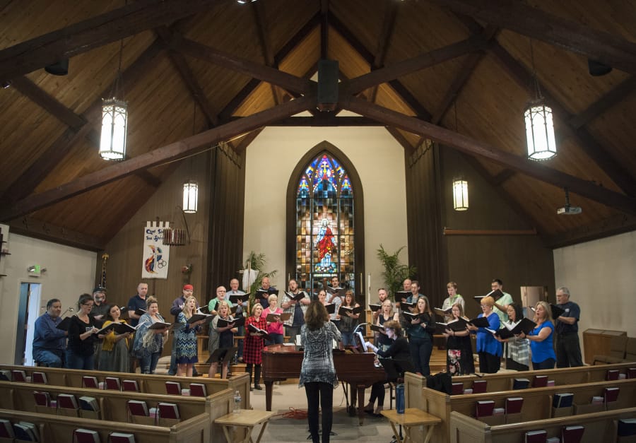 Not everyone was at Monday night’s rehearsal, but at full strength the 33-voice Reprise Choir includes 16 women and 17 men. That’s a strong and fairly unusual balance, according to co-directors April Duvic (conducting) and Janet Reiter (at the piano).