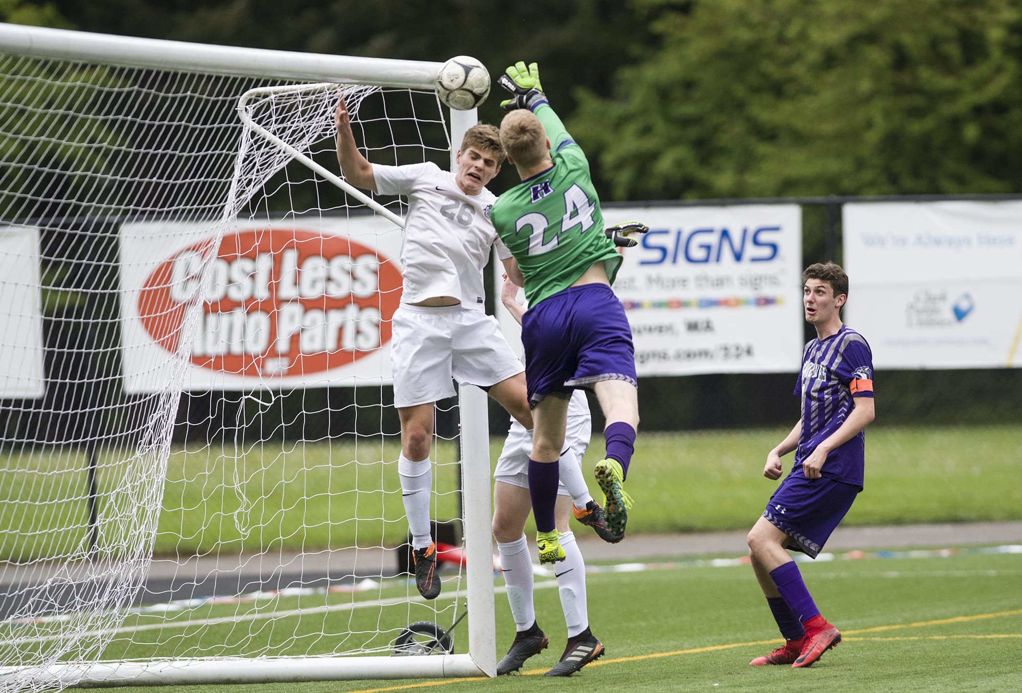 Heritage's goalie Robbie Meadors (24) attempts to block a goal from Skyview during the 4A GSHL boys soccer match at Kiggins Bowl, Monday May 1, 2018. The goal made Skyview tied with Heritage in the first half.