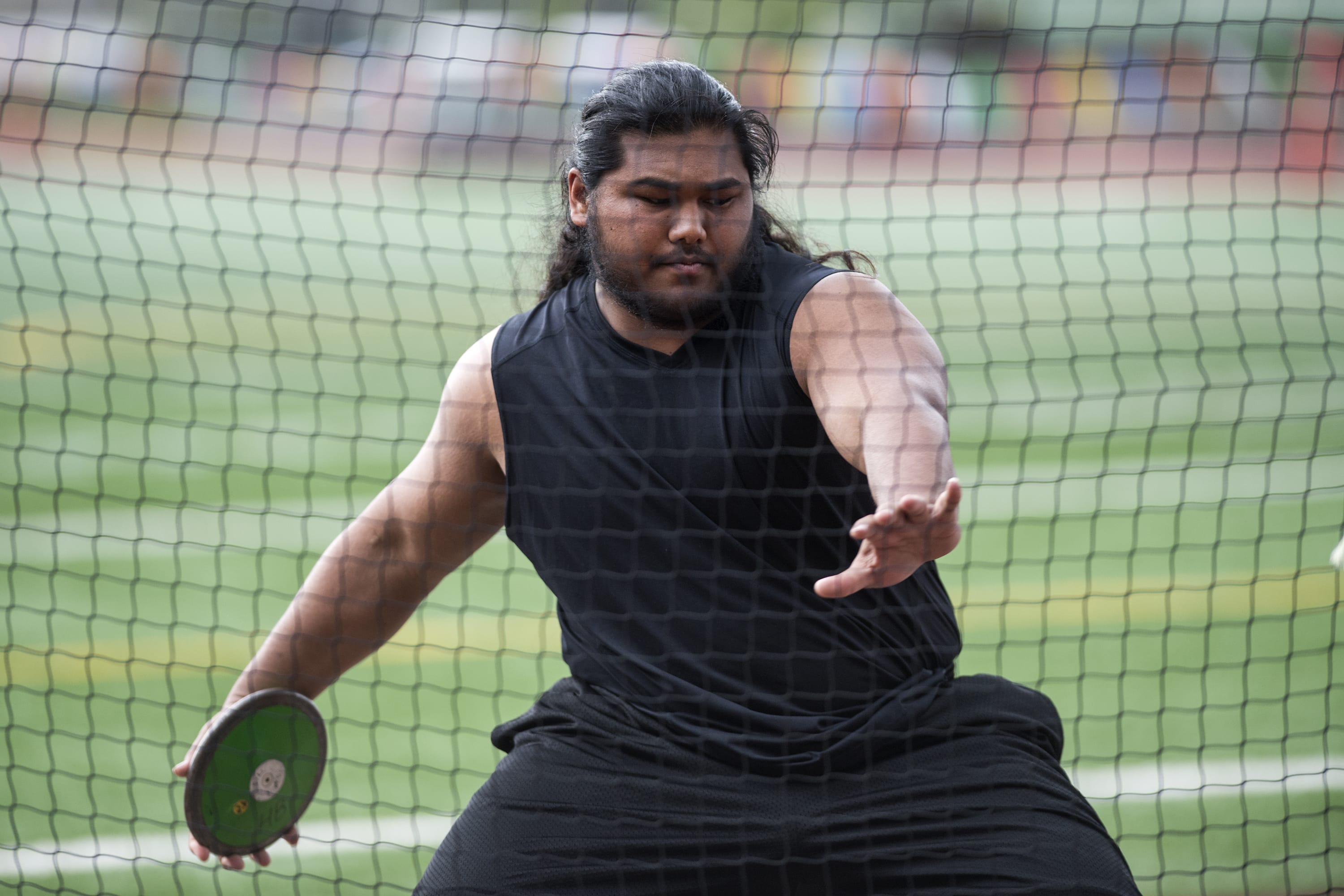 Hudson's Bay's Angel Terry winds up for a throw during the discus at the second day of the 4A, 3A district track and field meet at McKenzie Stadium in Vancouver on Thursday, May 10, 2018.