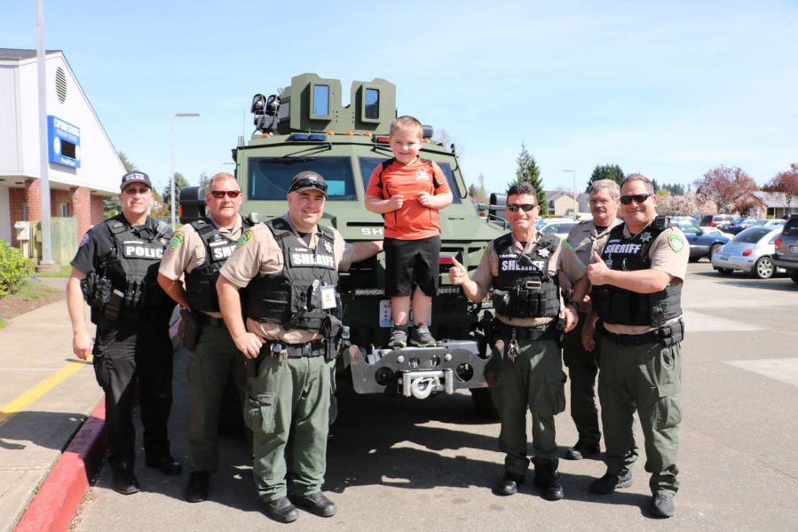 Battle Ground: In honor of his seventh birthday, Captain Strong Primary School first-grader Remington Waldkirch brought a “thank you” cake to the Clark County Sheriff’s Department, who surprised him and his classmates with a visit to the school later.