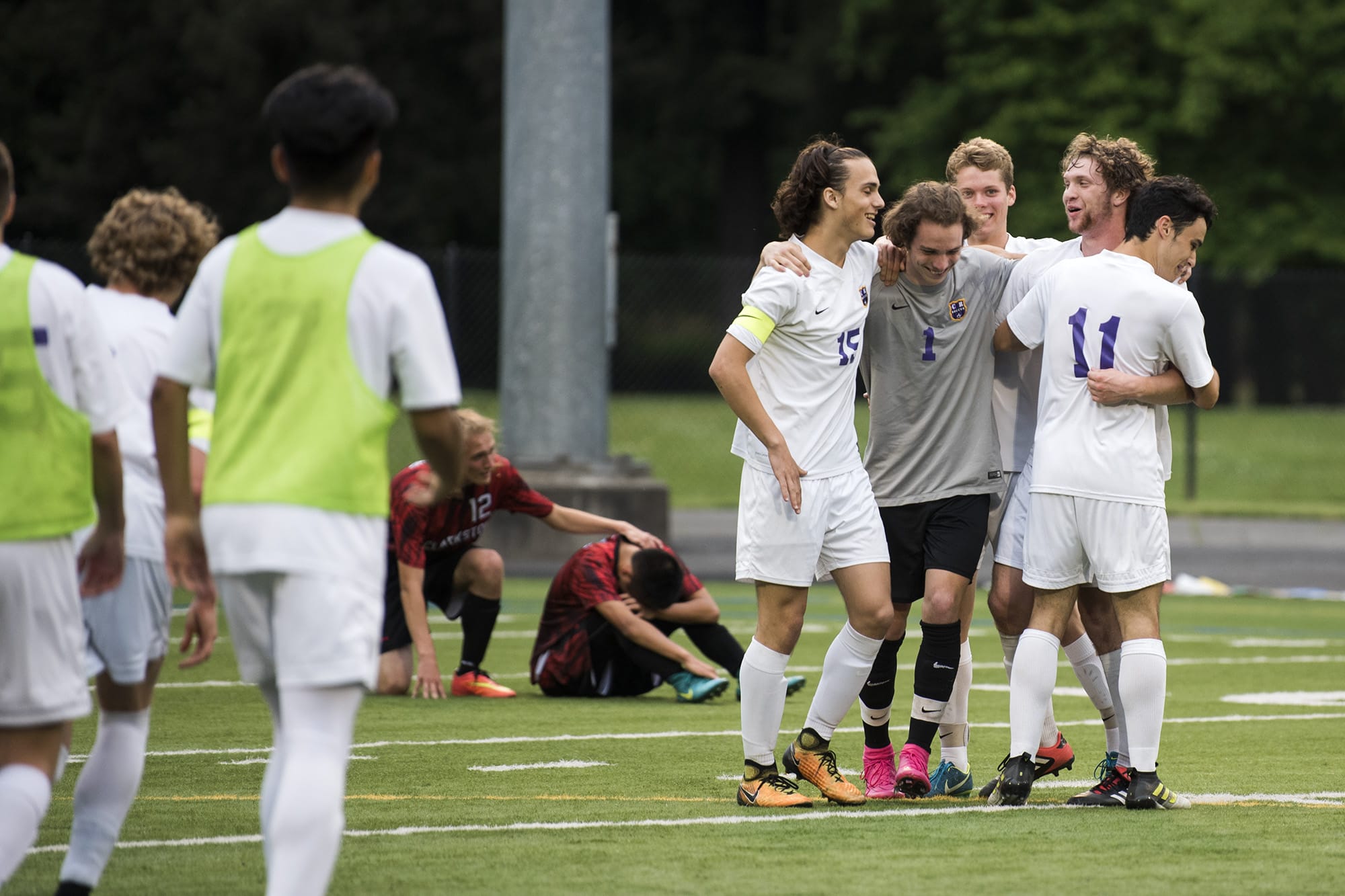 Columbia River celebrates their win against Clarkston after the first round of the Class 2A state playoffs at Kiggins Bowl in Vancouver on Wednesday, May 16, 2018. Columbia River won 3-2.