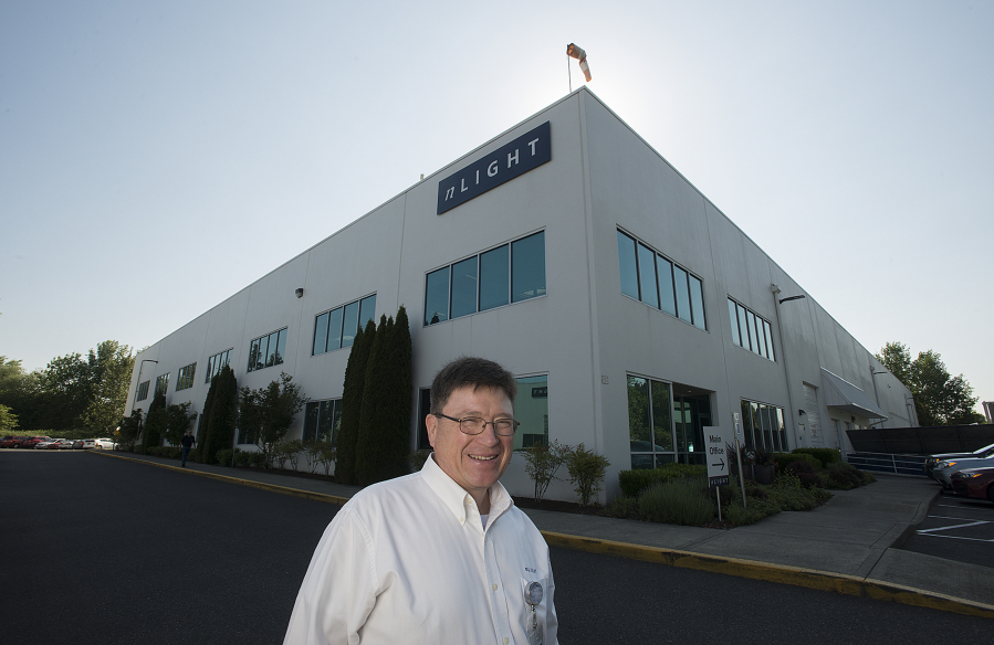 Mark DeVito, vice president of device engineering at nLIGHT, pauses for a photo outside the firm’s Vancouver office. DeVito helps steer the technology that has helped make nLIGHT a valuable, publicly traded company.