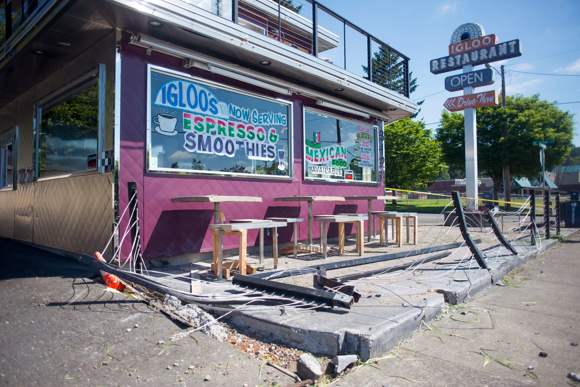 The aftermath of a deadly car crash at the Igloo Restaurant in Vancouver is pictured on Saturday. Three people died and one was injured in the accident on Friday.