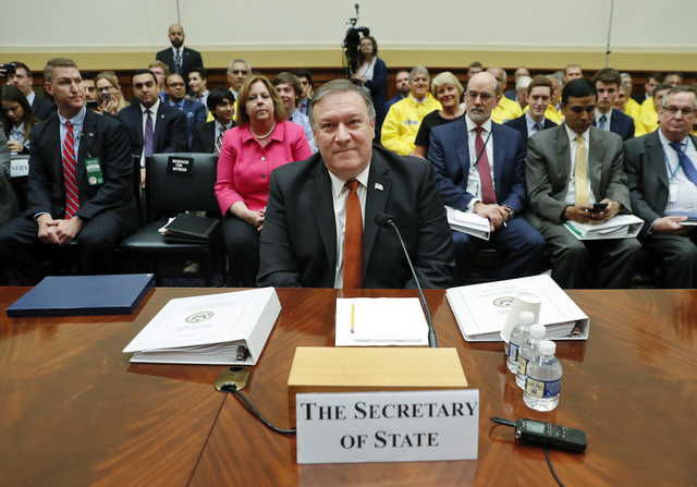 Secretary of State Mike Pompeo waits to testify before the House Foreign Affairs Committee hearing on Capitol Hill in Washington, Wednesday, May 23, 2018.