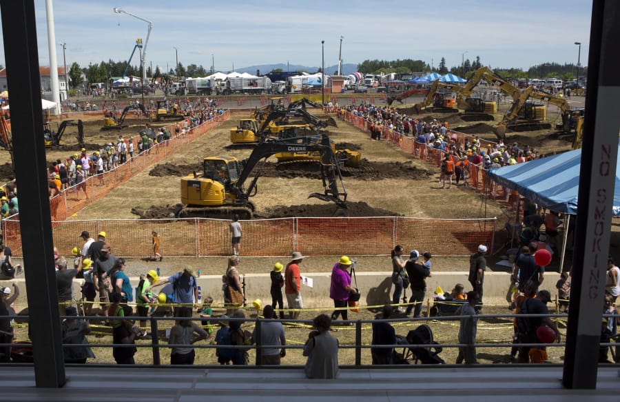 Crowds watch bulldozers at work at the annual Dozer Day event at the Clark County Fairgrounds in 2017.