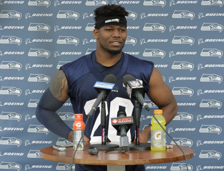 Seattle Seahawks running back Rashaad Penny talks to reporters Friday, May 4, 2018, following NFL rookie football camp in Renton, Wash. (AP Photo/Ted S.