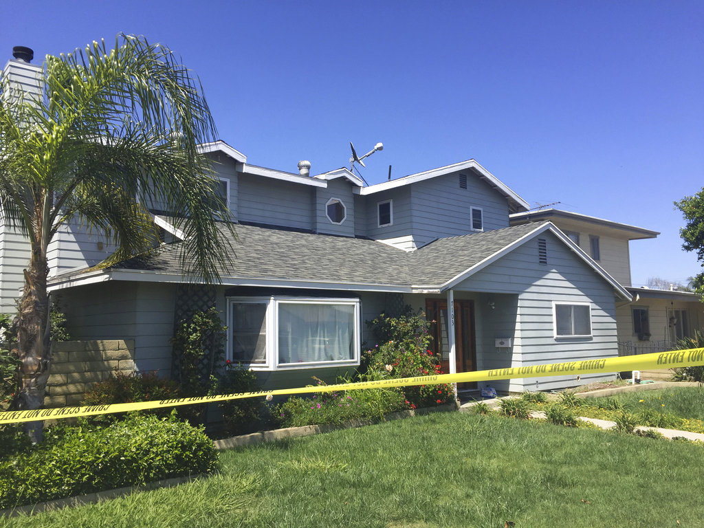 The home of a homicide victim, Ildiko Krajnyak, is seen after it was searched by police overnight in Trabuco Canyon, Calif., Wednesday, May 16, 2018. Sheriff's officials have officially identified the woman who died in yesterday's explosion in Aliso Viejo, Calif., as Krajnyak, 40, a licensed cosmetologist and spa owner. A deadly explosion that ripped through Krajnyak's Southern California day spa was a crime, authorities said Wednesday as they tried to figure out why someone would target a business that provided facials, waxing and wrinkle treatments.