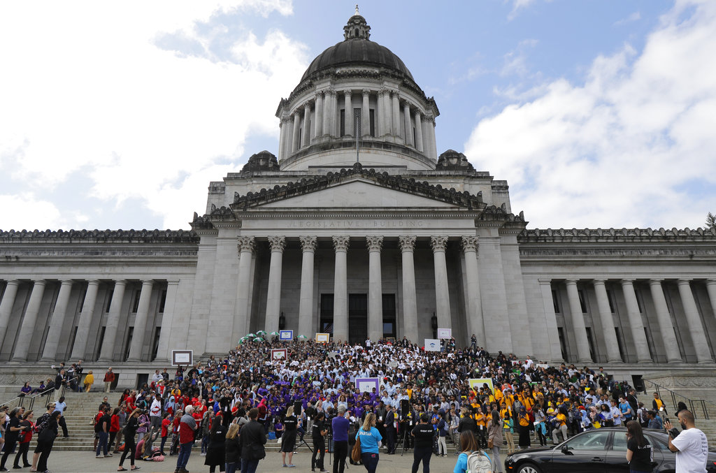 Hundreds of charter school students, teachers, and supporters rally at the Capitol in Olympia, Wash., Thursday, May 17, 2018. Teachers unions and other groups have sued over Washington state's 2016 charter school law, which was enacted after the justices struck down the old law as unconstitutional. (AP Photo/Ted S.