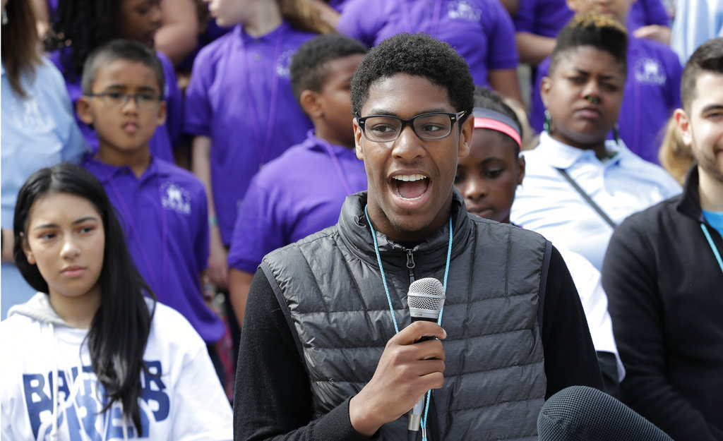 Jalen Johnson, an 11th-grader at Summit Sierra charter school in Seattle, speaks at a rally of charter school students, teachers, and supporters, Thursday, May 17, 2018, at the Capitol in Olympia, Wash. The rally was held after the Washington Supreme Court heard arguments over a lawsuit filed by teachers unions and other groups over Washington state's 2016 charter school law. (AP Photo/Ted S.