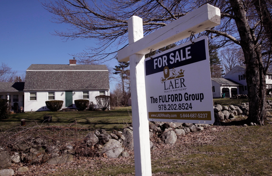 FILE- In this April 23, 2018, file photo, a home is listed for sale in Derry N.H. On Tuesday, May 29, the Standard & Poor’s/Case-Shiller 20-city home price index for March is released.