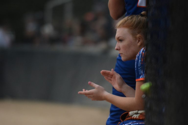 Ridgefield outfielder Haiydn Woodside cheers on her teammates in the Spudders' 4-3 extra innings loss to W.F.