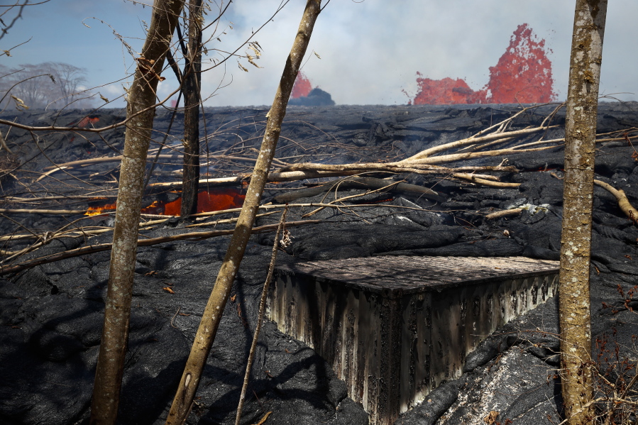 A corner of a property destroyed by lava is seen as fissures spew lava in the Leilani Estates subdivision near Pahoa, Hawaii, on May 22. (Jae C.