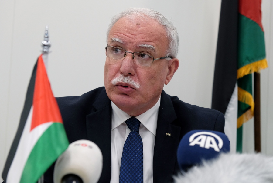 Palestinian Foreign Minister Riad Malki speaks during a press conference at the International Criminal Court on Tuesday. The Palestinian foreign minister asked the International Criminal Court on Tuesday to open an “immediate investigation” into alleged Israeli “crimes” committed against the Palestinian people.