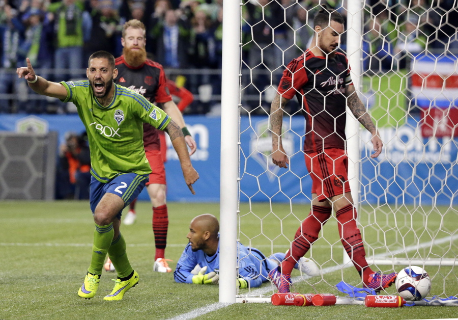In 2015, Seattle’s Clint Dempsey, left, played a big role in the Sounders' win over the Portland Timbers in Seattle. The Timbers host the Sounders on Sunday in the 100th meeting between the two rivals from the Pacific Northwest. (AP Photo/Ted S.