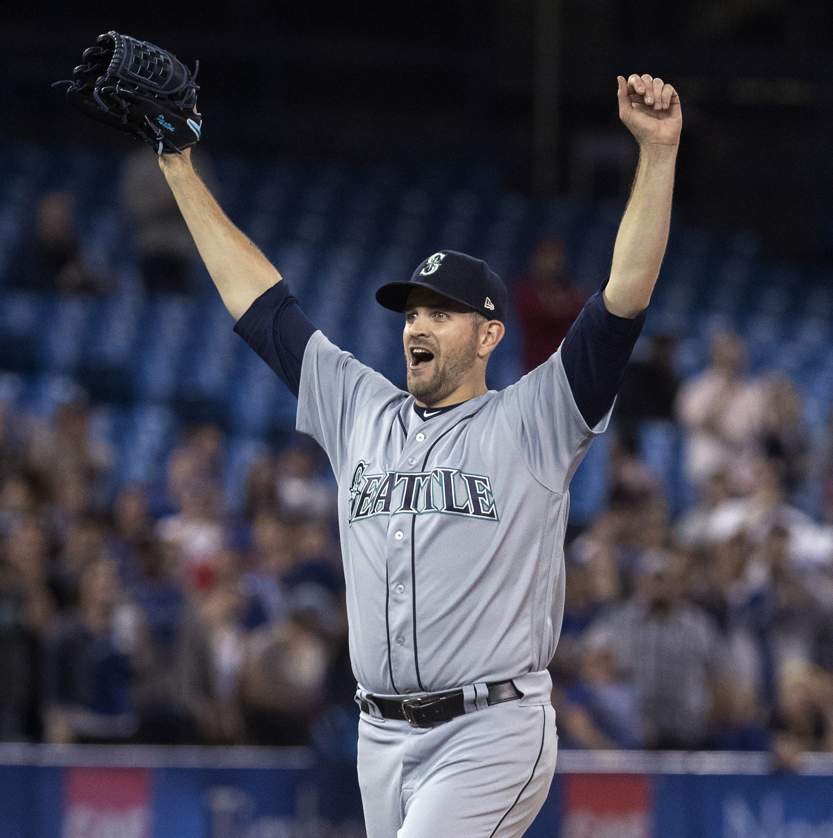 Seattle Mariners starting pitcher James Paxton celebrates after throwing a no-hitter against the Toronto Blue Jays in a baseball game Tuesday, May 8, 2018, in Toronto.
