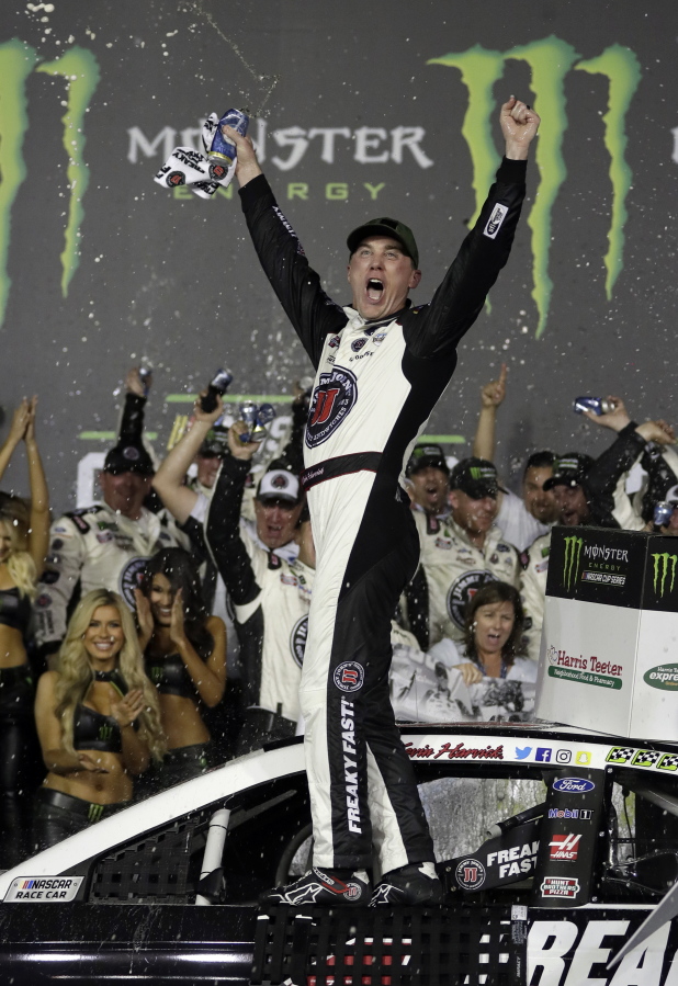 Kevin Harvick celebrates in Victory Lane after winning the NASCAR All-Star auto race at Charlotte Motor Speedway in Concord, N.C., Saturday, May 19, 2018.