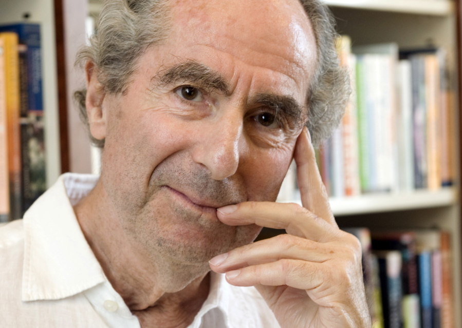 FILE - In this Sept. 8, 2008, file photo, author Philip Roth poses for a photo in the offices of his publisher, Houghton Mifflin, in New York. Roth, prize-winning novelist and fearless narrator of sex, religion and mortality, has died at age 85, his literary agent said Tuesday, May 22, 2018.
