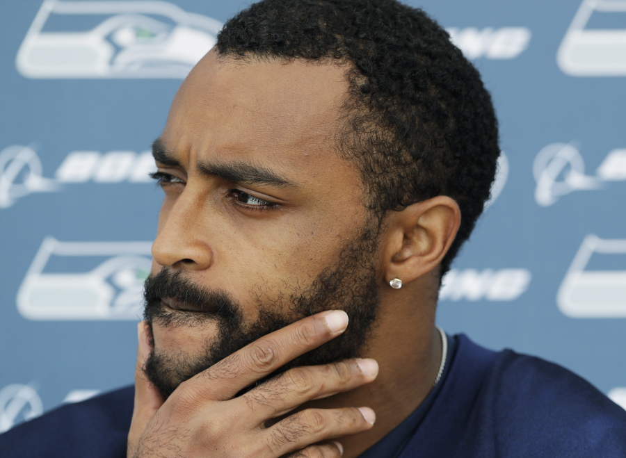 Seattle Seahawks wide receiver Doug Baldwin talks to reporters following NFL football practice, Thursday, May 24, 2018, in Renton, Wash. (AP Photo/Ted S.
