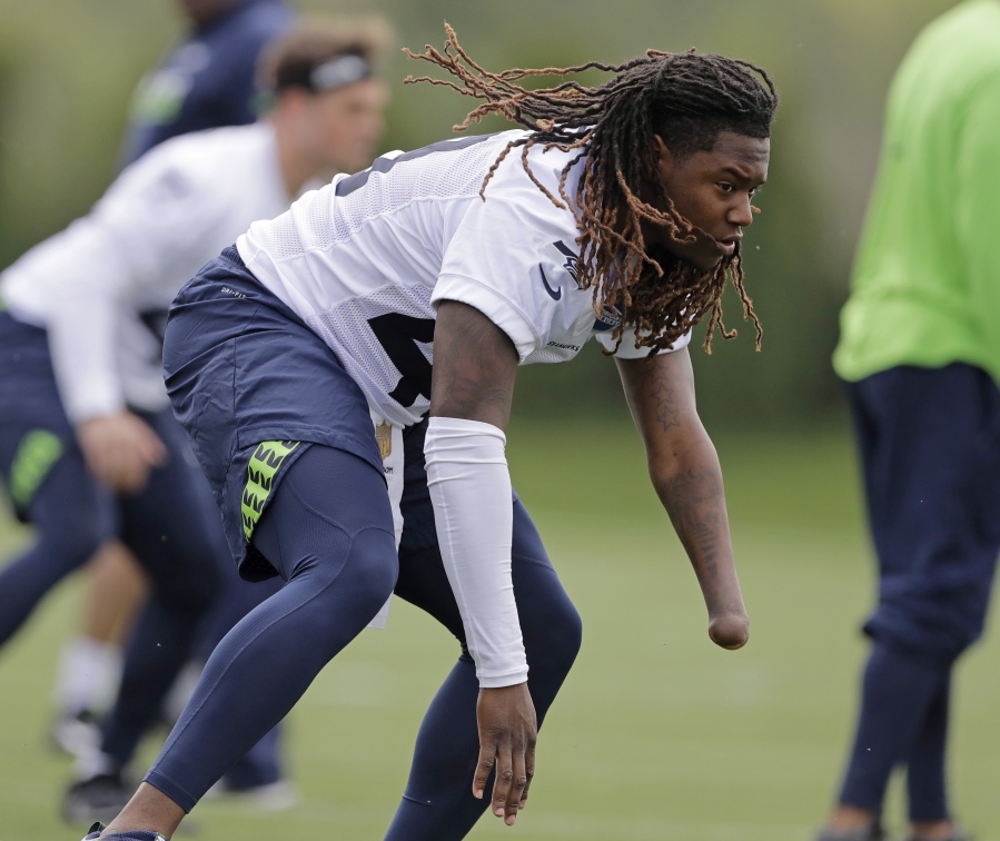 Seattle Seahawks linebacker Shaquem Griffin takes part in a drill Friday, May 4, 2018, during the NFL football team’s camp in Renton, Wash. (AP Photo/Ted S.