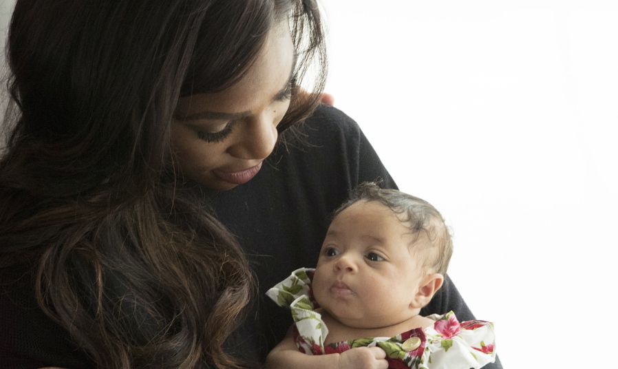 Serena Williams holds her daughter, Alexis Olympia Ohanion Jr., in a scene from the HBO’s “Being Serena.” HBO