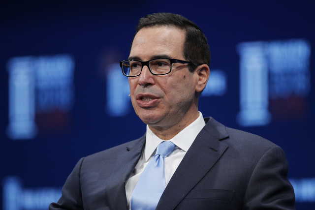 In this April 30, 2018, file photo, Treasury Secretary Steven Mnuchin speaks during a discussion at the Milken Institute Global Conference, in Beverly Hills, Calif. Mnuchin said Sunday, May 20, that the United States and China are stepping back from a possible trade trade war between the world’s two biggest economies after two days of talks that he said had produced “meaningful progress.” (AP Photo/Jae C.