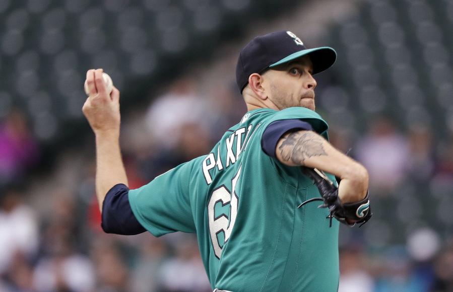 Seattle Mariners starting pitcher James Paxton throws to a Minnesota Twins batter during the first inning of a baseball game Friday, May 25, 2018, in Seattle.