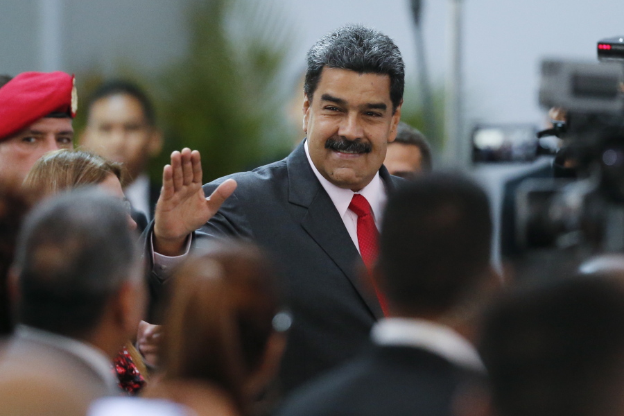 Nicolas Maduro arrives Tuesday at the National Electoral Council in Caracas, Venezeula, to be officially declared the winner of the recent presidential election.