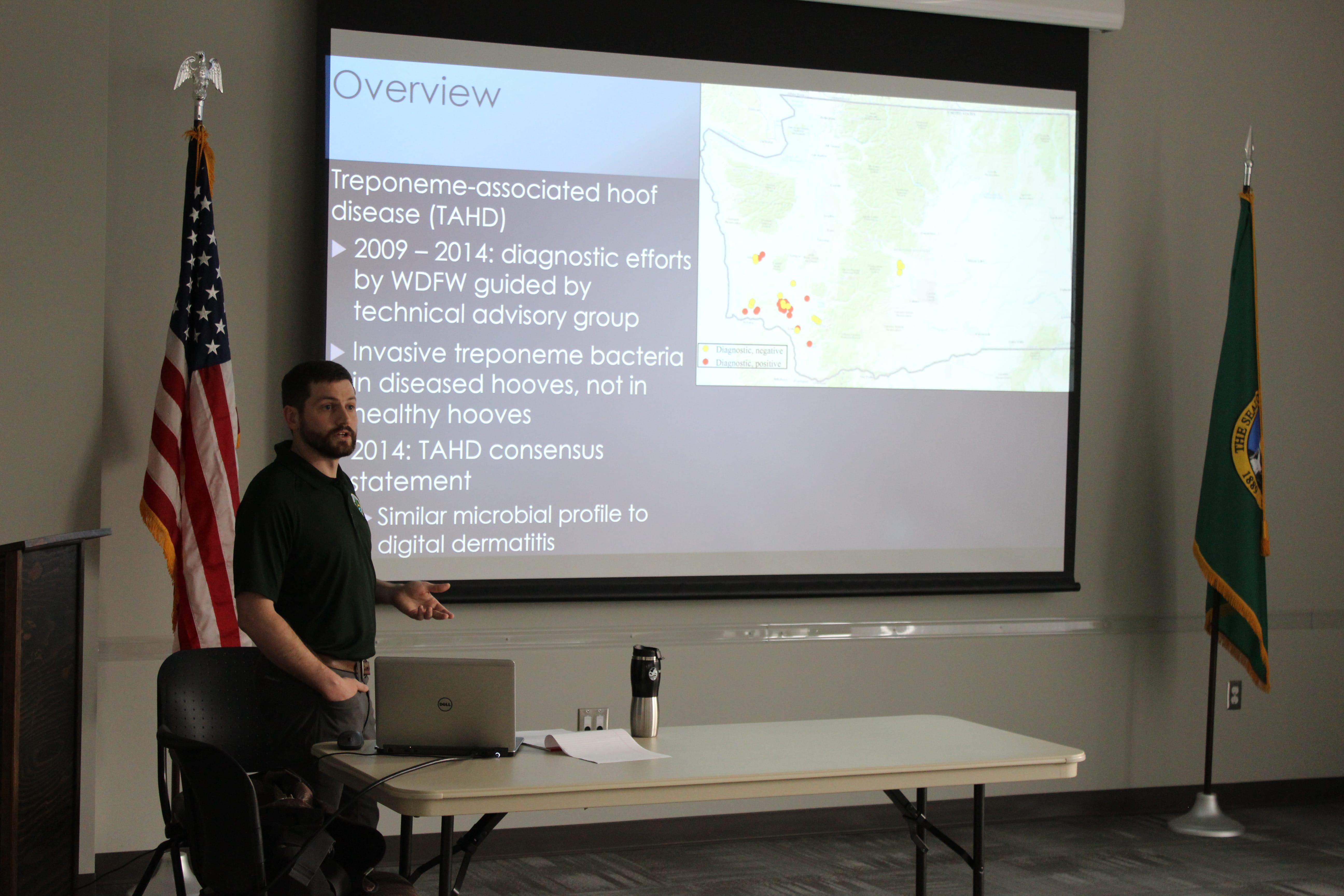 Eric Gardner, WDFW wildlife program director, explains to members of the public the recent discovery of elk infected with hoof disease in the Trout Lake Valley, and the department’s planned response.