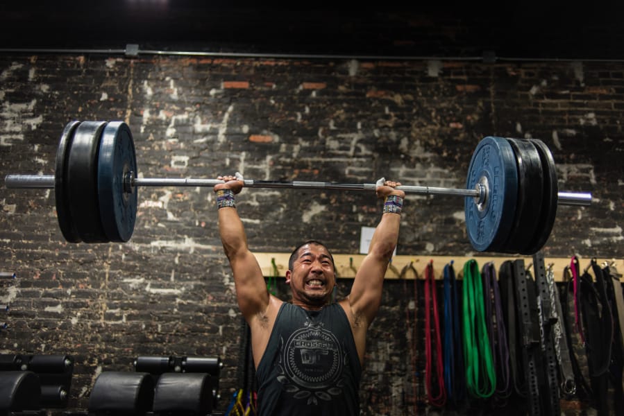 Tyler Downing, who has been doing Crossfit for four years, works out at Crossfit DC, a fitness movement sweeping the nation.