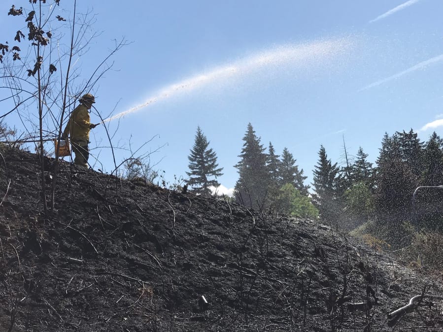 It’s anyone’s guess how many big wildfires will occur this year, but officials say this fire season could be rough if weather trends continue. Last May was unseasonably warm and dry, spurring grass and brush fires like this one on May 24 that firefighters from Vancouver and Clark County Fire District 6 extinguished near Interstate 5 in Vancouver.