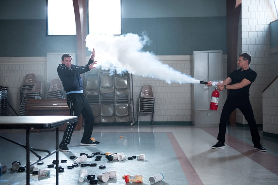 Jon Hamm, left, and Jeremy Renner in “Tag.” Kyle Kaplan/Warner Bros.