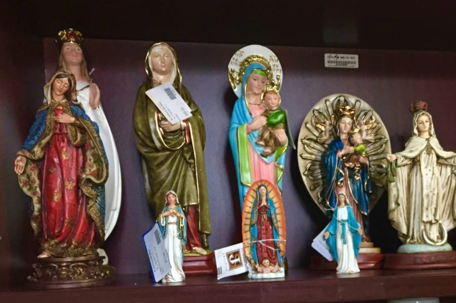 Statues of saints are among the items sold at the gift shop in St. Anthony of Padua Catholic Church in Falls Church, Va.