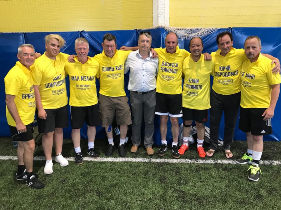 Members of Vancouver-based adult club soccer team "Fat Tuesdays" pose in Russian-gifted jerseys after a friendly match against a Russian club team in Saint Petersburg, Russia (Courtesy/George Reynolds).