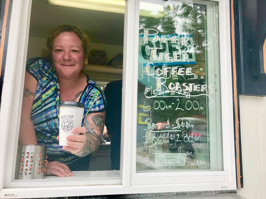 Andi Meyer is a barista, at Paper Tiger Coffee Roasters’ kiosk on the northwest corner of Mill Plain and Grand boulevards.