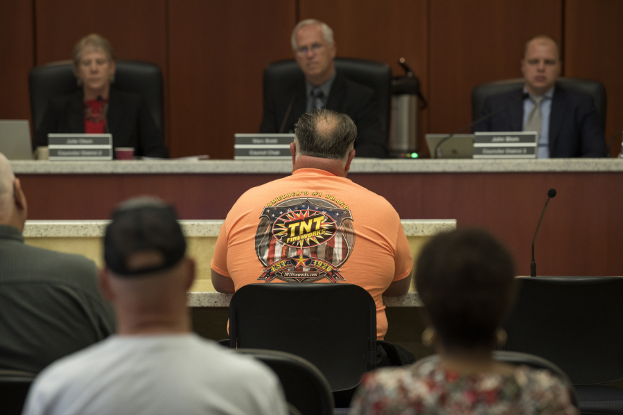 Beau Leach, operator of TNT Fireworks Warehouse, addresses the council in support of preserving the current state standard on fireworks during the Clark County Council meeting Tuesday. Leach called the eventual vote, which only allows people to shoot fireworks on July 4, a fair compromise.