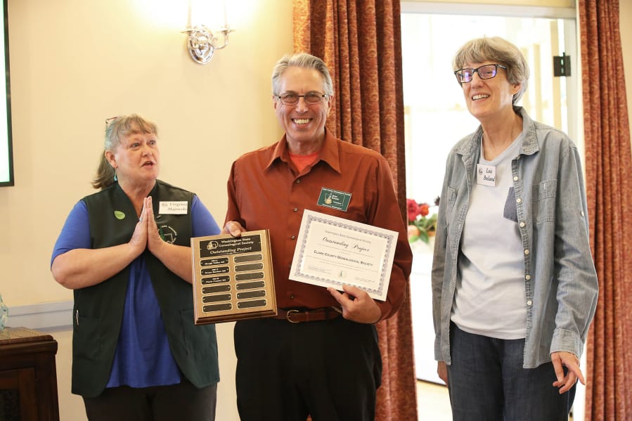 Edgewood Park: Washington State Genealogical Society President Virginia Majewski, left, presents the 2018 Outstanding Project Award to Clark County Genealogical Society President Brian Runyan, center, and Lois Bosland, right, for the “Vancouver Tax Ledger Project.”