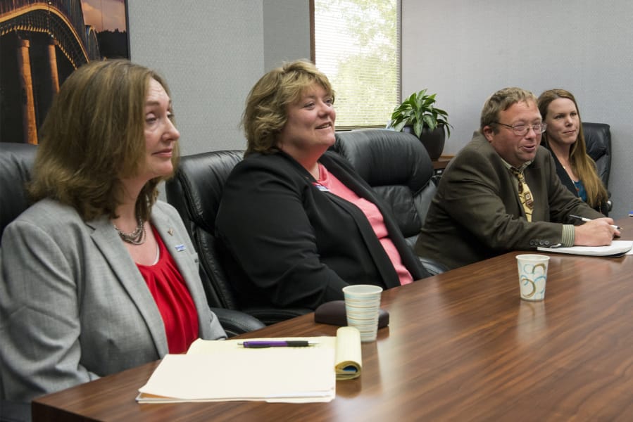 Vancouver City Councilor Laurie Lebowsky, from left, candidate Mary Elkin, candidate Adam Shetler and candidate Sarah Fox speak with The Columbian’s Editorial Board.