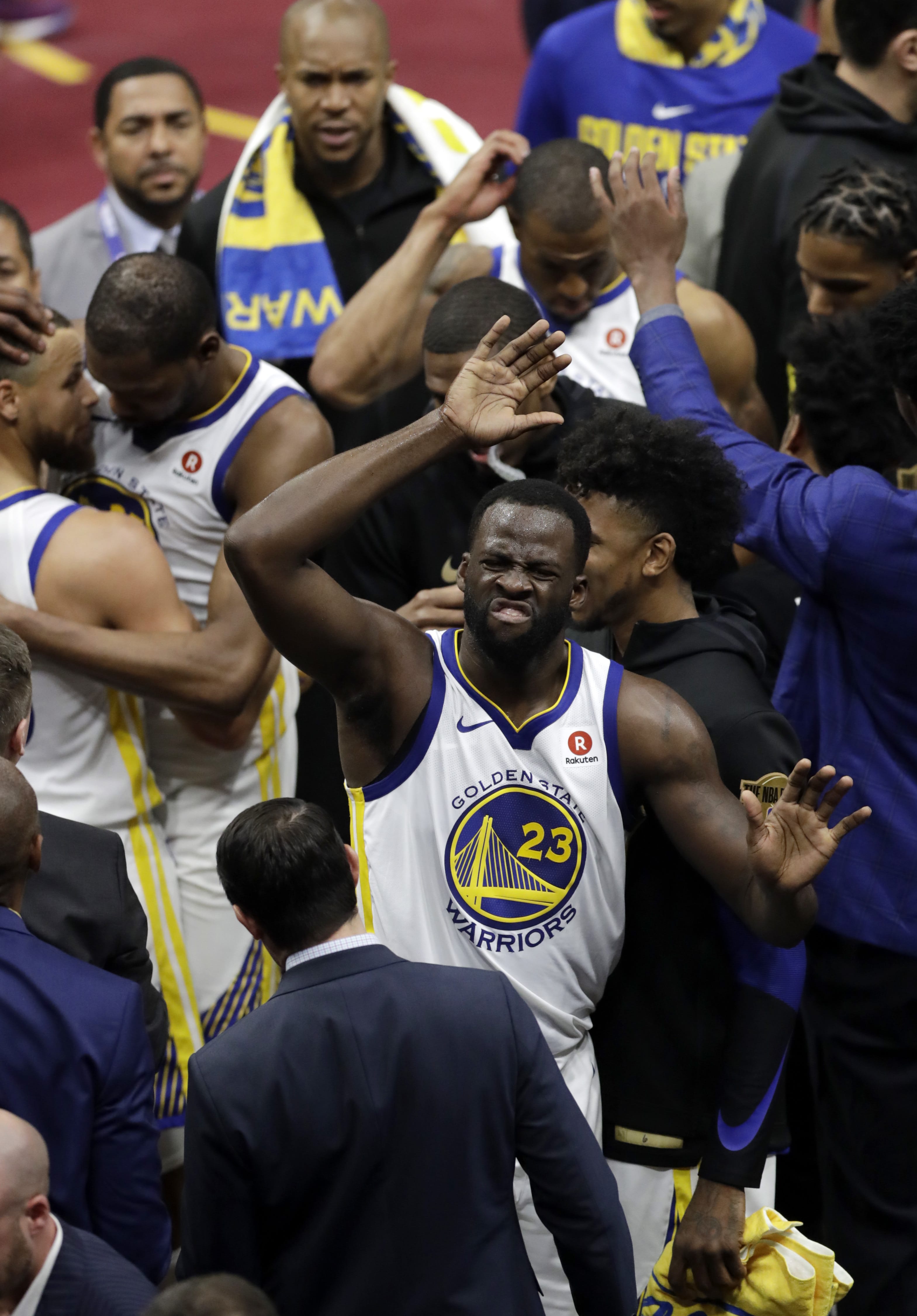 Golden State Warriors' Draymond Green celebrates after Game 3 of basketball's NBA Finals, Wednesday against the Cleveland Cavaliers, June 6, 2018, in Cleveland. The Warriors defeated the Cavaliers 110-102 to take a 3-0 lead in the series.
