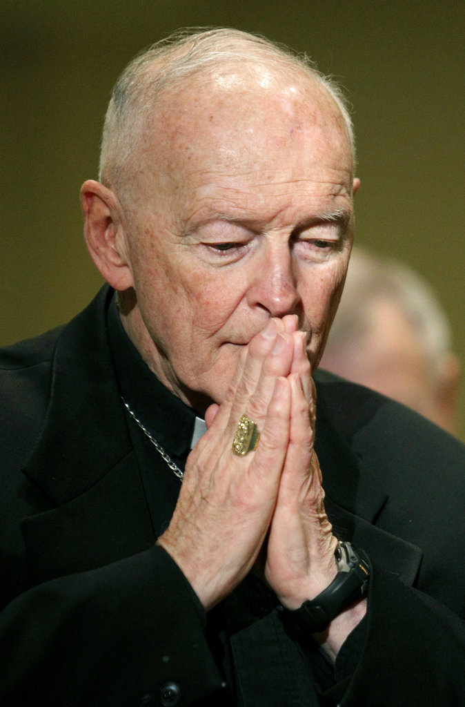 FILE - In this Nov. 14, 2011 file photo, Cardinal Theodore McCarrick prays during the United States Conference of Catholic Bishops' annual fall assembly in Baltimore. The retired archbishop of Washington, D.C. has been removed from public ministry over allegations he sexually abused a teenager while a priest in New York more than 40 years ago.