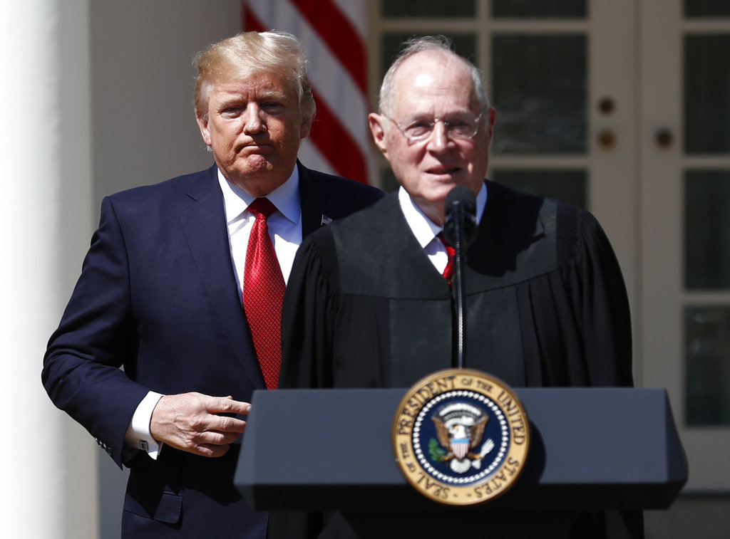 FILE - In this April 10, 2017, file photo, President Donald Trump, left, and Supreme Court Justice Anthony Kennedy participate in a public swearing-in ceremony for Justice Neil Gorsuch in the Rose Garden of the White House White House in Washington. The 81-year-old Kennedy said Tuesday, June 27, 2018, that he is retiring after more than 30 years on the court.