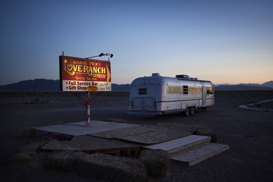 A sign advertises the Love Ranch brothel in Crystal, Nev. A coalition of religious groups and anti-sex trafficking activists have launched referendums to ban brothels in two of Nevada’s seven counties where they legally operate.