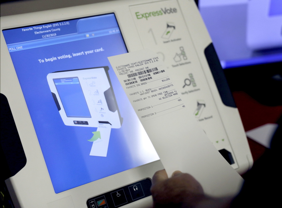 A new voting machine which prints a paper record on display at a polling site in Conyers, Ga., Oct. 19, 2017. Georgia officials have estimated it could cost over $100 million to adopt the machines statewide.