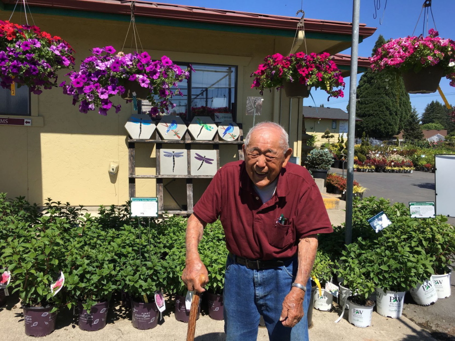 In this recent photo, George Tsugawa, owner of Tsugawa Nusery, poses outside the business in Woodland. During his 96 years on Earth, Tsugawa was jailed in a Japanese internment camp, forced to cope with rampant racism and worked his way out of poverty, to name just a few of his hardships. Today, he owns a thriving nursery in Woodland and is frequently seen supervising his business, cracking jokes with customers and employees. According to Tsugawa, the obstacles in his life helped him become resilient.