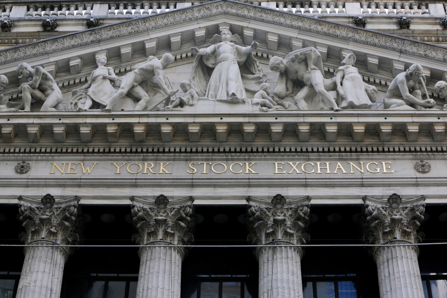 FILE- This April 5, 2018, file photo shows the facade of the New York Stock Exchange. The U.S. stock market opens at 9:30 a.m. EDT on Thursday, June 14.