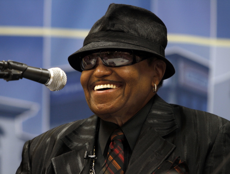 FILE - In this June 2, 2010 file photo, Joe Jackson, father of the late Michael Jackson, laughs during a news conference about the construction of the proposed Michael Jackson Performing Arts and Cultural Center and Museum, in Gary, Ind. Jackson, the patriarch of America’s most famous musical clan has died, says a family source on Wednesday, June 27. He was 89.