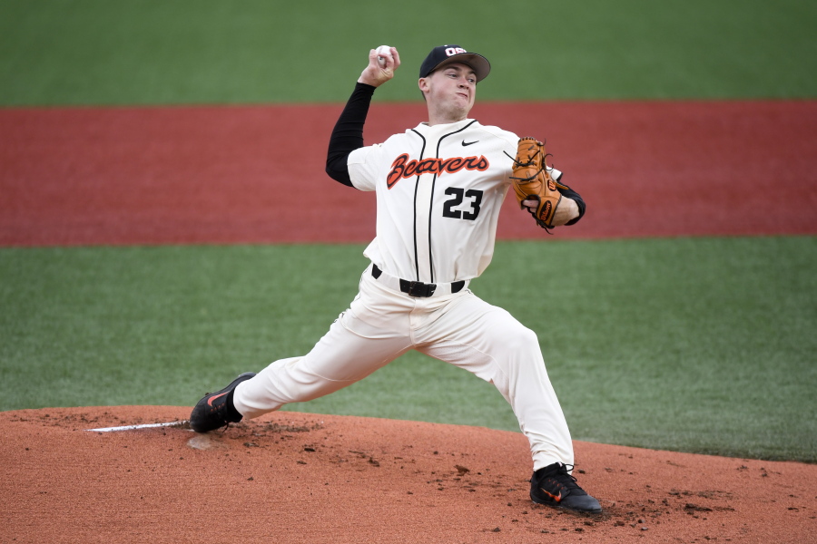 Oregon State’s Kevin Abel pitches against LSU in the first inning of an NCAA collage baseball game in Corvallis, Ore., Sunday, June 3, 2018.