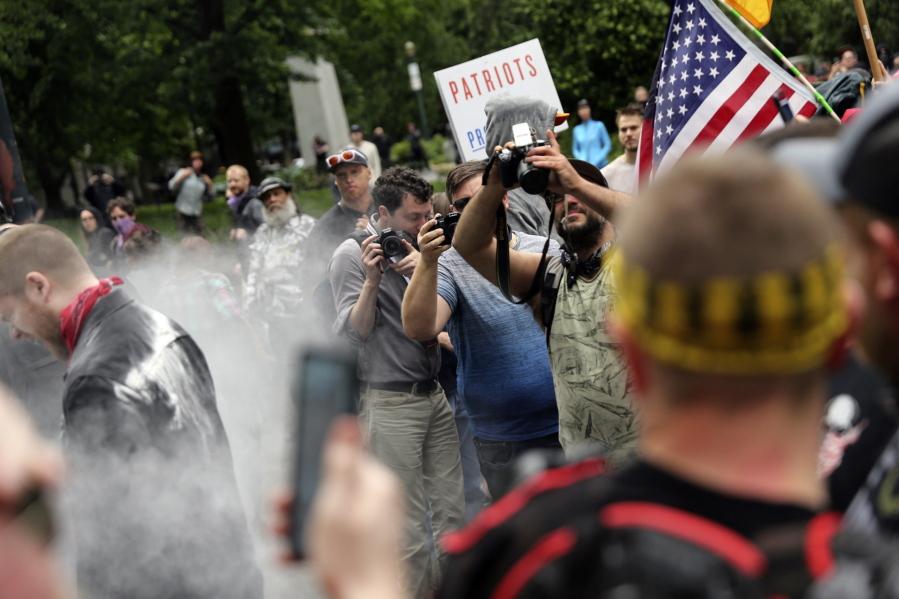 Photographers capture dueling demonstrations June 3 between antifacists known as antifa and a right wing group called Patriot Prayer in downtown Portland. The conflict between Patriot Prayer and the so-called “antifa” has dominated the landscape at marches and rallies in recent months.
