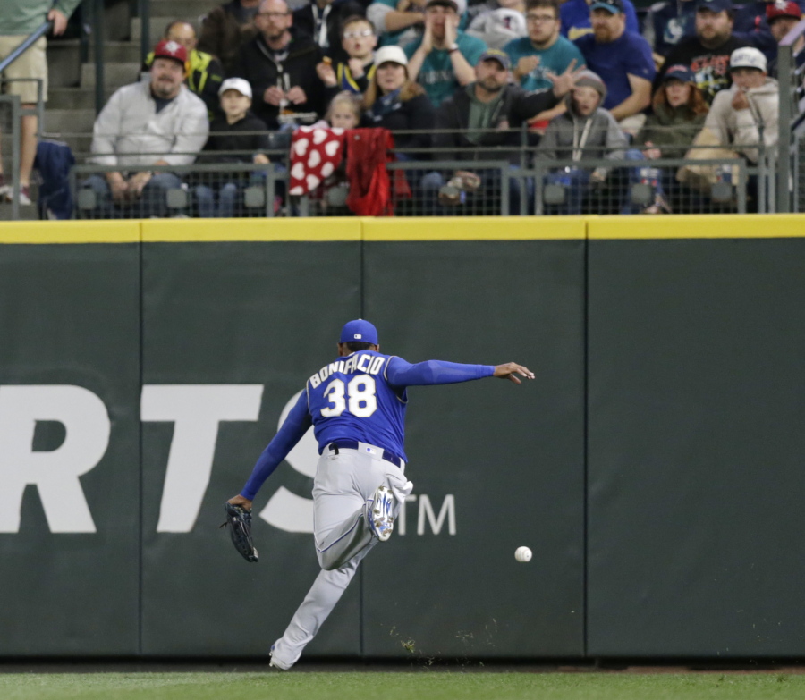 Kansas City Royals right fielder Jorge Bonifacio chases the ball hit by Seattle Mariners’ Denard Span for an RBI double during the third inning of a baseball game Saturday, June 30, 2018, in Seattle.